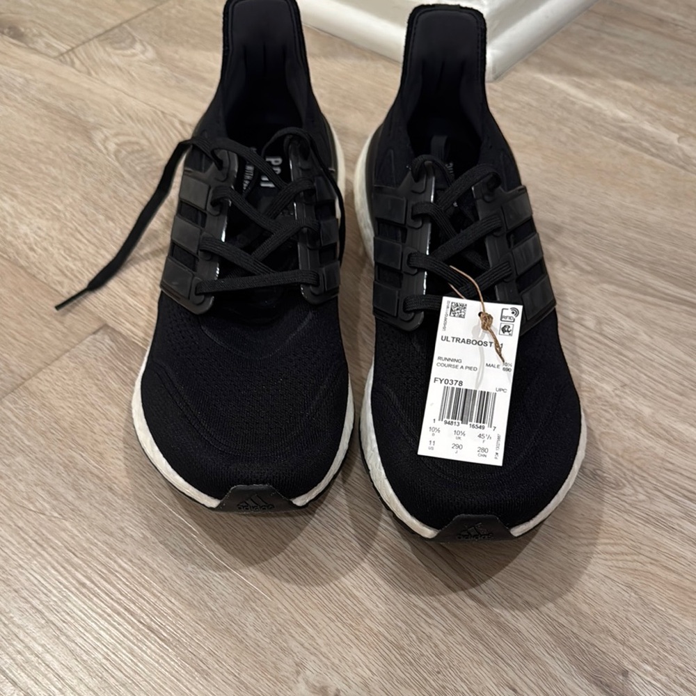 Adidas Black Athletic Shoes with Mesh Upper and Cushioned Sole